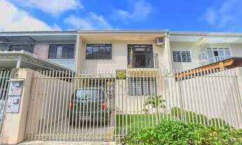 Imagem 2: Sobrado para venda tem 111 metros quadrados com 3 quartos em Tarumã - Curitiba - PR