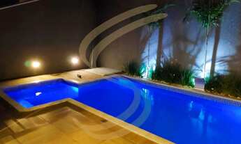 Imagem 4: Casa com 3 Suítes, Piscina Aquecida e Área Gourmet no Portal Horizonte