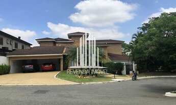 Imagem: Casa com 4 suítes, 4 vagas e 5 banheiros