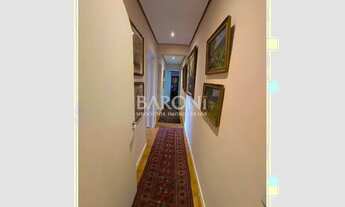 Imagem 4: Apartamento à venda no Jardim Paulista, amplo living com varanda e lavabo, dormitórios amp