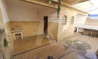 Imagem 5: Casa com 3 quartos, sendo 1 suíte, sala, cozinha, banheiro social e 3 vagas de garagem des