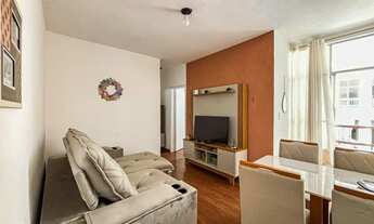 Imagem: Quarto e sala em prédio com elevador e