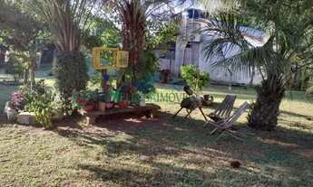 Imagem 7: Velleda oferece belo sítio com mezanino, arborizado e com ótima localização em condomínio