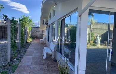 Imagem 4: Casa com 2 dormitórios para alugar, 180 m² por R$ 6.071,36/mês - Campeche - Florianópolis