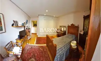 Imagem 7: Apartamento à venda no Jardim Paulista, amplo living com varanda e lavabo, dormitórios amp