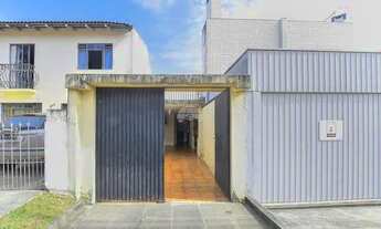 Imagem 3: Sobrado para venda tem 111 metros quadrados com 3 quartos em Tarumã - Curitiba - PR