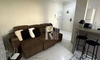 Imagem 4: Apartamento semi mobiliado para assumir financiamento com 02 dormitórios, cozinha com ilha