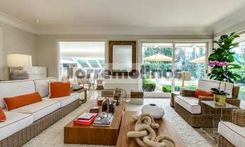 Imagem 4: Linda casa com projeto de Marcos Tomanik no Cidade Jardim com 4 suítes, piscina e quadra d