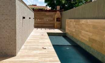 Imagem 3: Vendo apartamento térreo com área externa próximo ao mar e área de lazer completa