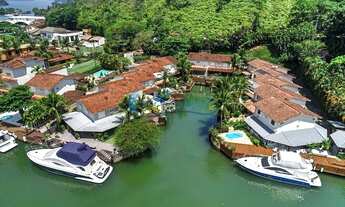 Imagem: Casa duplex no canal com vaga molhada para