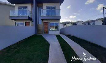 Imagem: Sobrado com passagem lateral e duas suítes