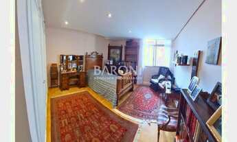 Imagem 6: Apartamento à venda no Jardim Paulista, amplo living com varanda e lavabo, dormitórios amp