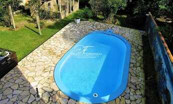 Imagem: Casa de 4 dormitórios na Praia do Morro