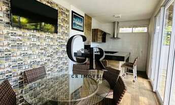 Imagem 6: Sobrado com piscina de borda infinita no Condomínio do Lago