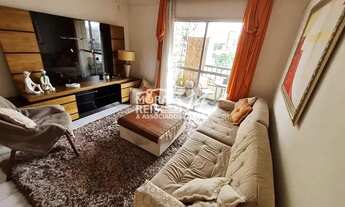 Imagem 2: Apartamento com 77m², 2 dormitórios sendo 1 suíte com armários, 1 escritório com estante e