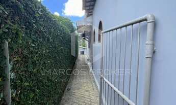 Imagem 4: PORTÃO - Casa no condomínio Village com portaria 24 horas, próximo a transporte coletivo