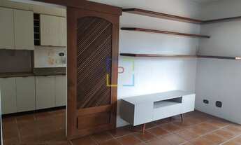 Imagem 2: Apartamento com 50m², 1 dormitório, sala, sacada, cozinha com armários, 1 vaga