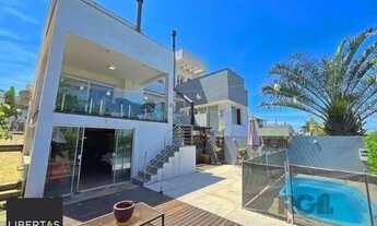 Imagem 2: Casa em Porto Alegre, no bairro Aberta dos Morros, com 3 dormitório(s), e 3 banh