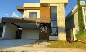 Imagem 6: Casa moderna, com pé direito alto e conceito aberto