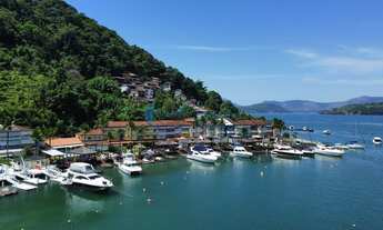 Imagem 3: Casa tríplex no Condomínio Village Itanema frente mar com vaga molhada para barco até 55 p