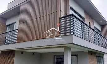 Imagem: SOBRADO COM TERRAÇO. 03 QUARTOS 02 SUÍTES