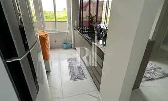 Imagem 6: Apartamento semi mobiliado para assumir financiamento com 02 dormitórios, cozinha com ilha