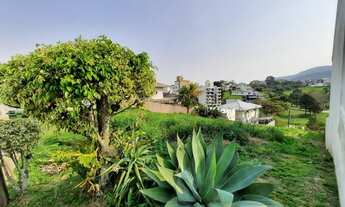 Imagem 6: O lote está localizado no bairro Pedra Branca tem 575 m²