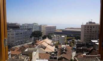 Imagem: Quarto e sala no centro