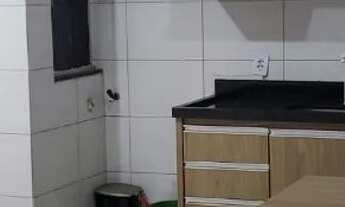 Imagem 2: Kitnet com armários e fogão