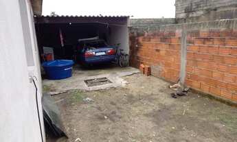 Imagem: Salão com casa no fundo