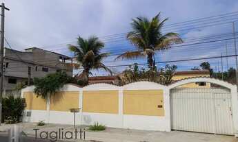 Imagem 7: Casa duplex em rua asfaltada no Coqueiral