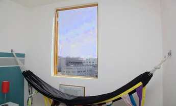 Imagem 2: Quarto e sala no centro