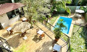 Imagem 2: Casa de condomínio térrea para venda possui 380 metros quadrados com 5 quartos