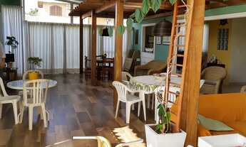 Imagem 6: Casa com Ampla Área de Convivência e Piscina