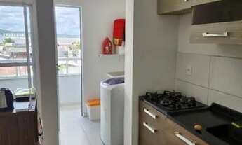 Imagem 6: Excelente apartamento em São Vicente com 60m² de área útil, com área de lazer. Ótima oport