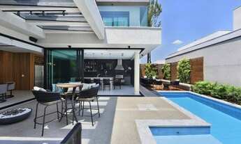 Imagem 2: Casa de condomínio para venda possui 400 metros quadrados com 4 quartos