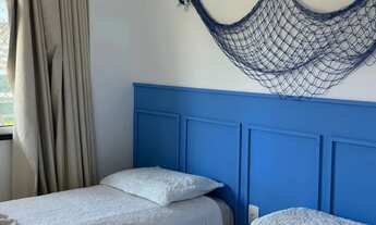 Imagem 2: Pe na areia com 3 quartos