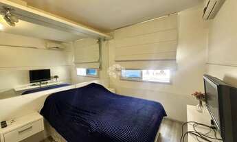 Imagem 5: APARTAMENTO SEMIMOBILIADO COM 2 QUARTOS E SACADA NO CANTO EM FLORIANÓPOLIS PRONTO PARA MOR