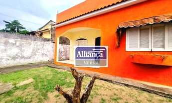 Imagem 4: Casa linear com 2 dormitórios, 1 suíte, churrasqueira em área coberta, quintal e 3 vagas d