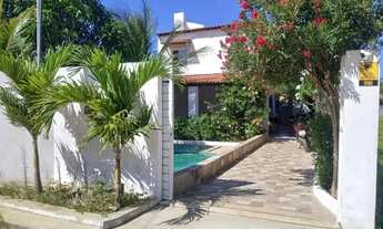 Imagem: Casa com piscina na praia