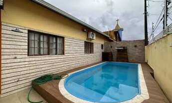 Imagem 2: Casa na praia com 3 dormitórios