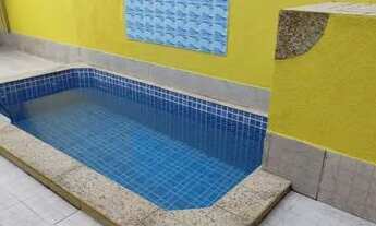 Imagem 4: Casa com piscina e churrasqueira