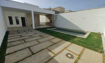 Imagem 2: Casa nova com Piscina para venda possui 130 metros quadrados com 3 quartos sendo 2 suites