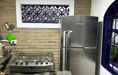 Imagem 2: Casa estilo Grécia com piscina cocanha