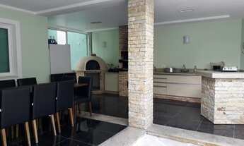 Imagem 6: Casa de condomínio para venda possui 500 metros quadrados com 5 quartos