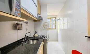 Imagem 3: Apartamento mobiliado à venda no Champagnat com 63 m² e sacada com churrasqueira