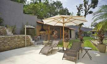 Imagem 2: Sobrado para venda possui 170 metros quadrados com 3 quartos em Jardim Las Palmas - Guaruj