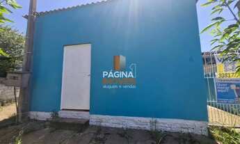 Imagem 2: Página 1 Imóveis anuncia casa com 02 dormitórios, no bairro Guajuviras em Canoas/RS