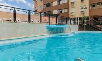 Imagem 6: Apartamento com 3 dormitórios no 11º andar com sacada integrada a sala e churrasqueira no