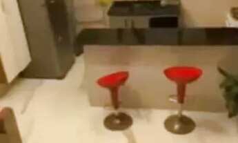 Imagem 2: Casa com piscina e salão de festas com churrasqueira